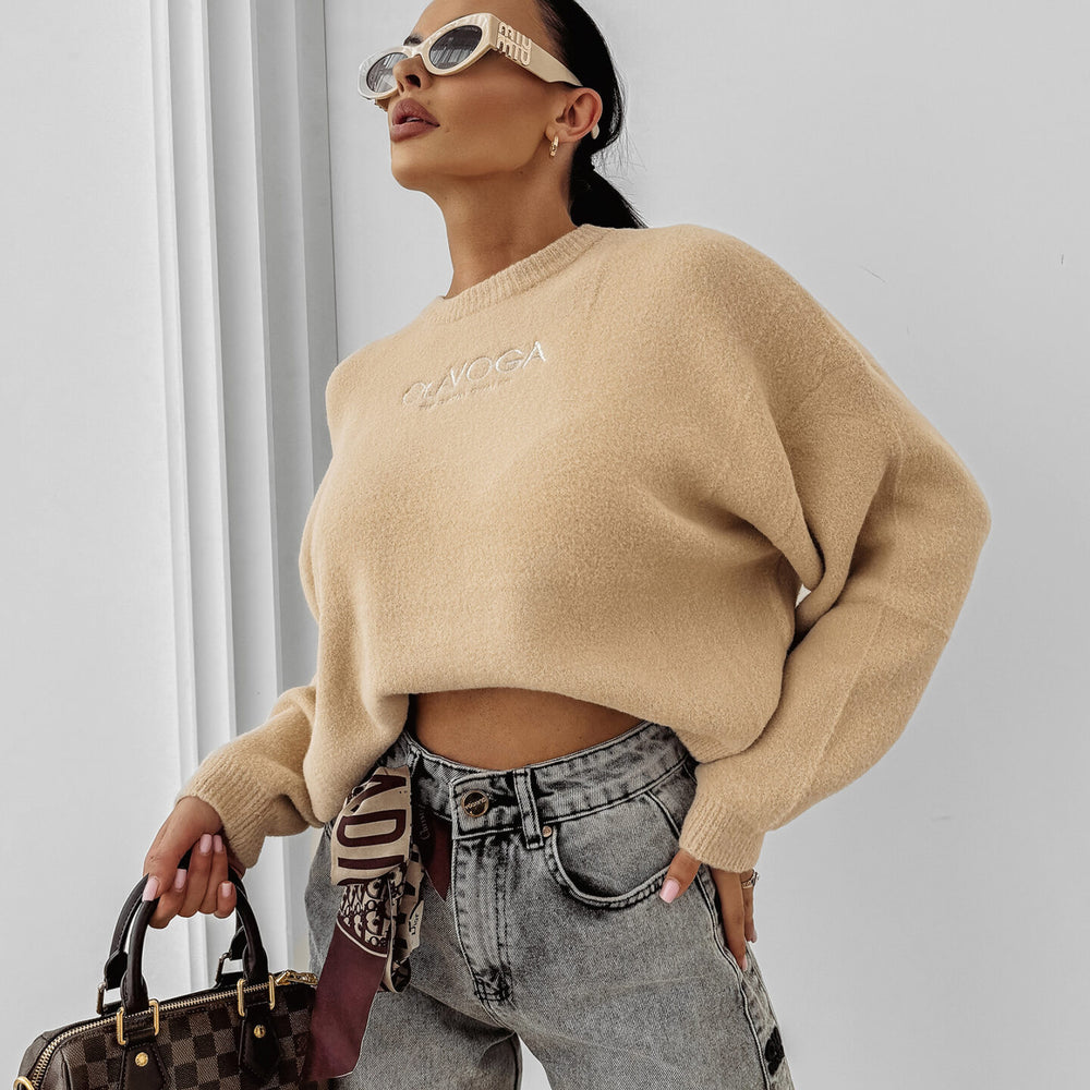 
                      
                        DELIA women's sweater beige
                      
                    